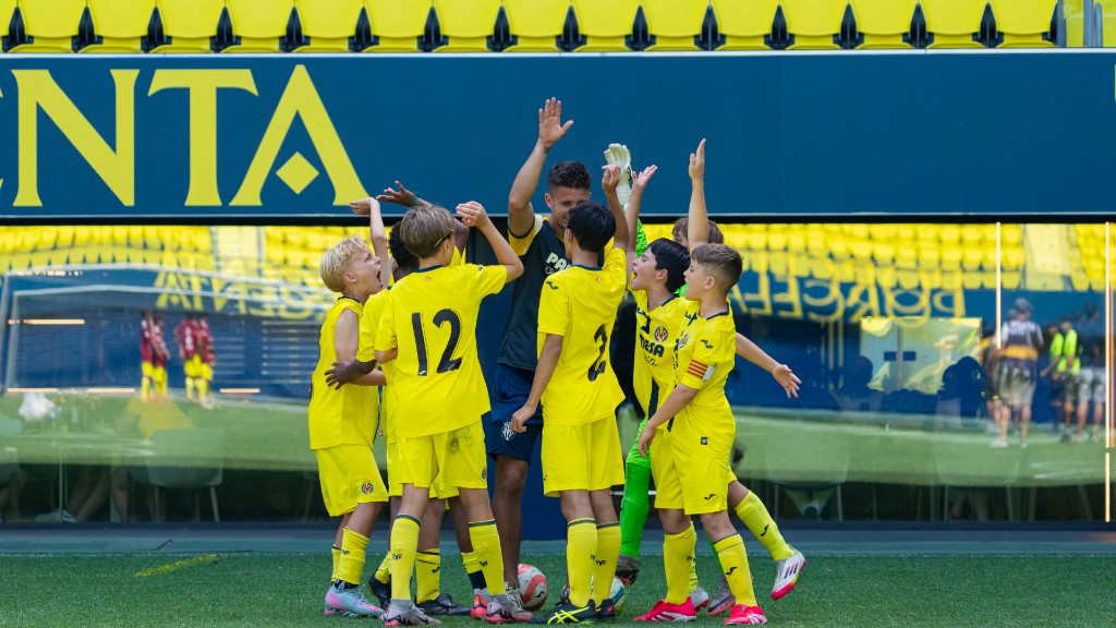 Players celebrating with coach
